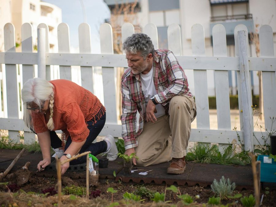 A resident gardening outdoors